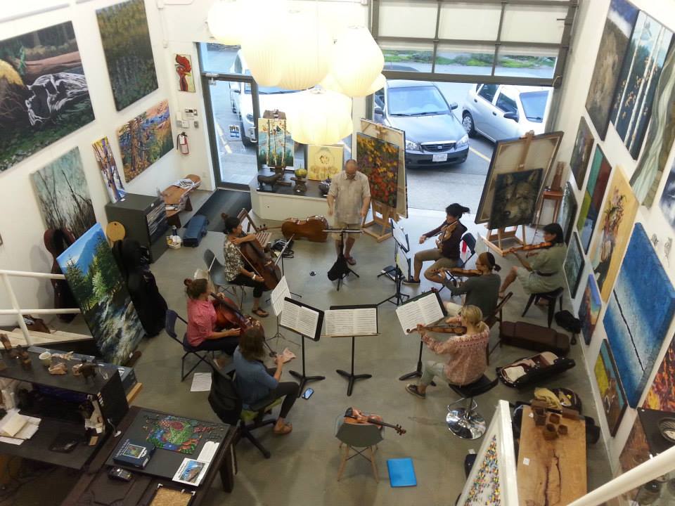 The orchestra rehearsing in Art Junction Gallery, 2016